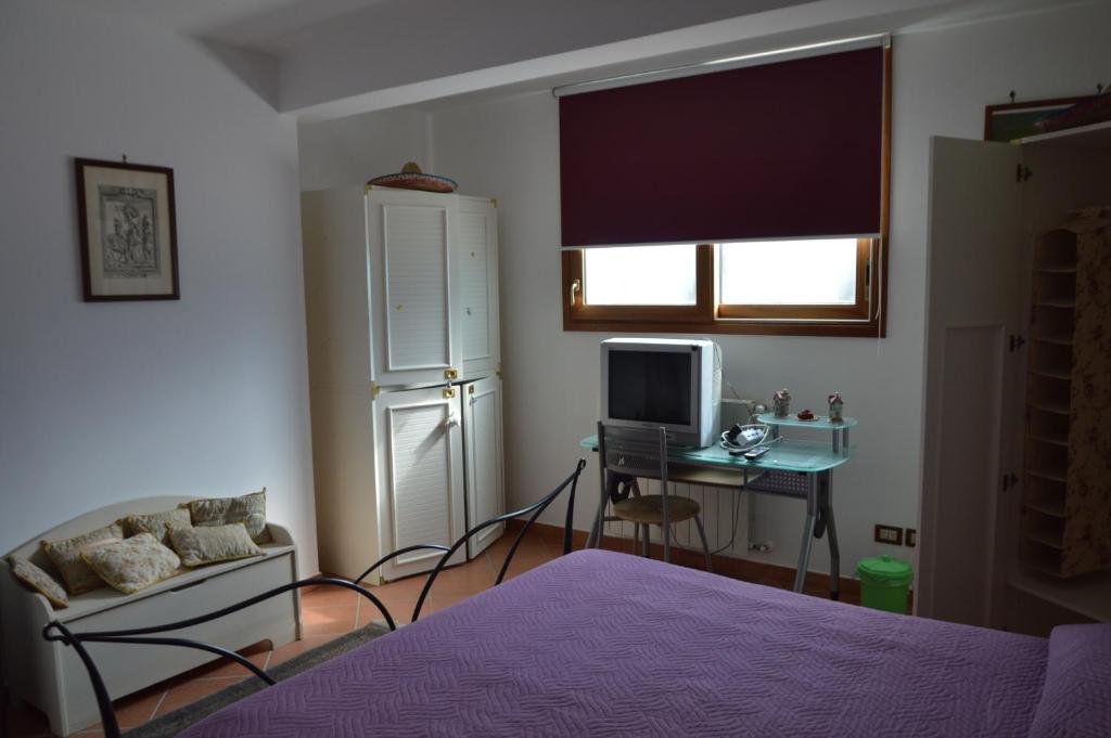 Postel nebo postele na pokoji v ubytování Villa Matilde
