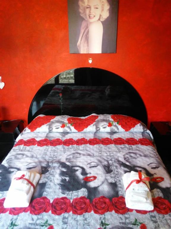Postel nebo postele na pokoji v ubytování B&B Lo Scrigno