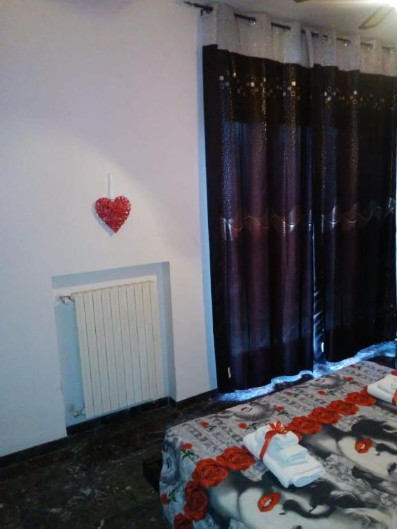 Postel nebo postele na pokoji v ubytování B&B Lo Scrigno