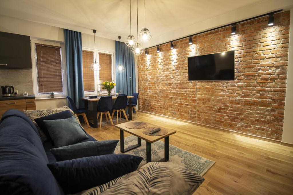 Svetainės erdvė apgyvendinimo įstaigoje Apartament Rajska 12