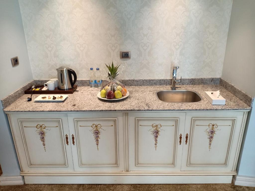 مطبخ أو مطبخ صغير في Gewan Hotel Cairo
