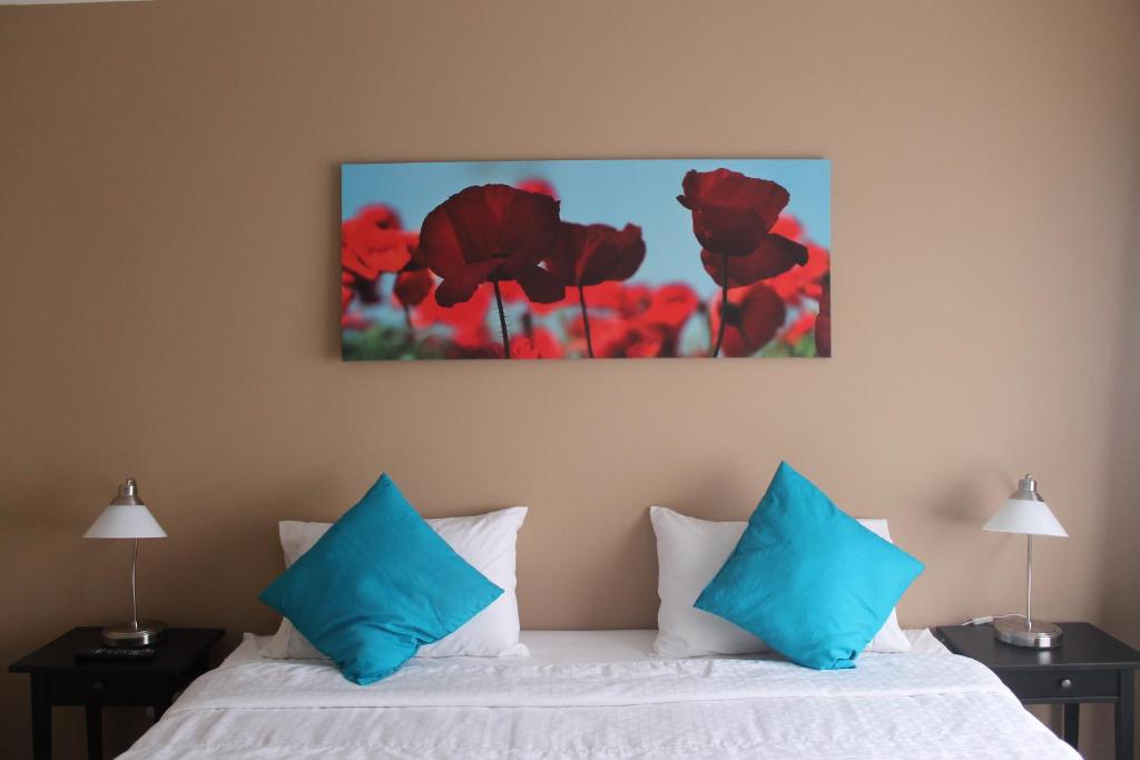 Postel nebo postele na pokoji v ubytování Eden Beach Resort - Bonaire