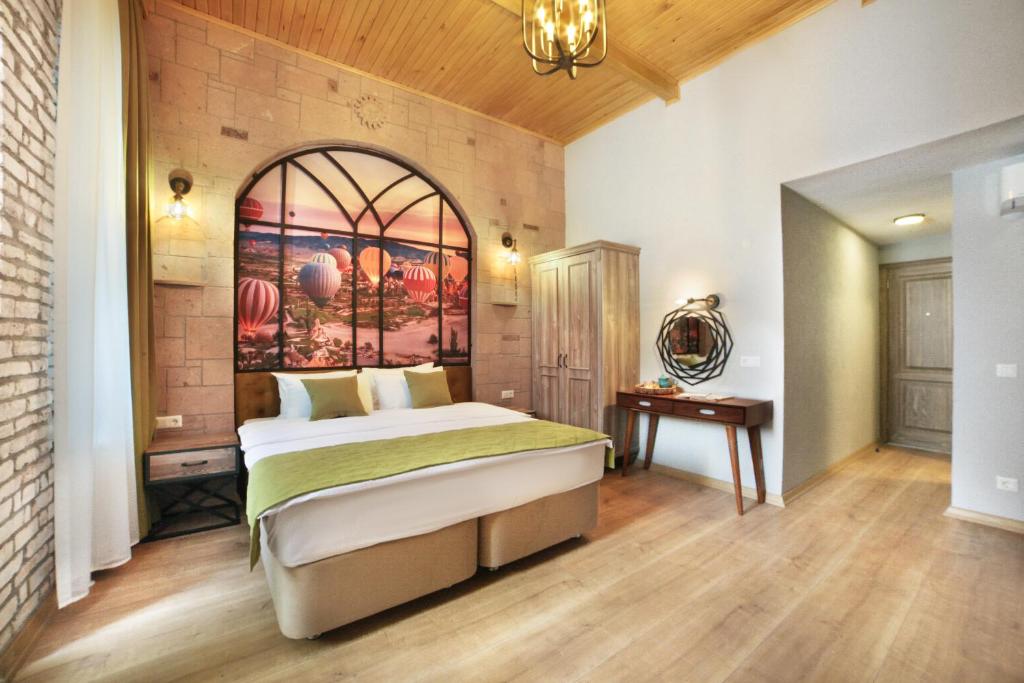 Postel nebo postele na pokoji v ubytování Ardilas Residence