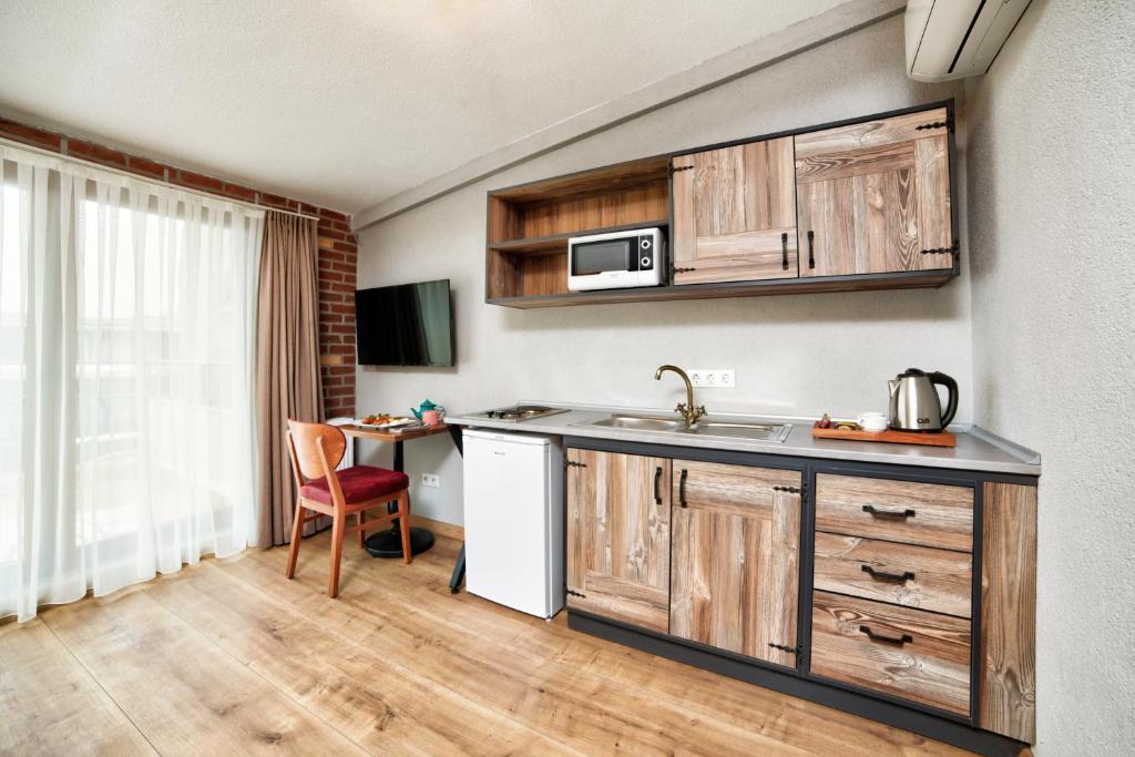 Kuchyň nebo kuchyňský kout v ubytování Ardilas Residence