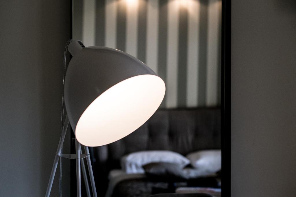 Postel nebo postele na pokoji v ubytování Stamos Hotel