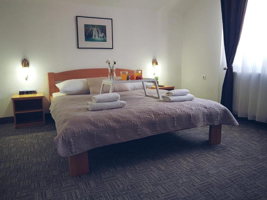 Postel nebo postele na pokoji v ubytování Guesthouse Kovačević