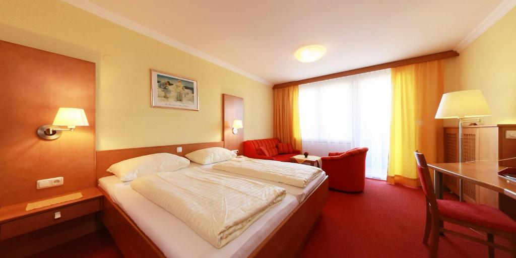 Posteľ alebo postele v izbe v ubytovaní Hotel Lohninger-Schober 3 Stern Superior