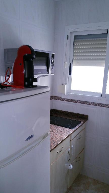 A kitchen or kitchenette at "Corner of happiness"