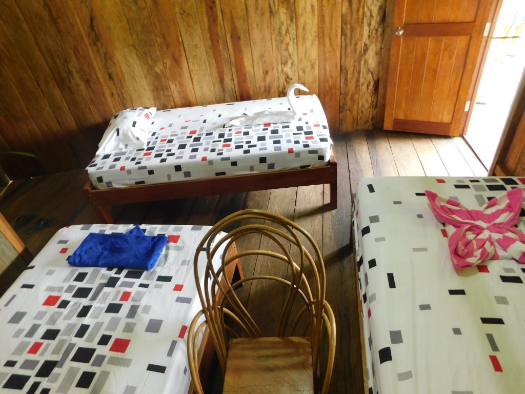 Postel nebo postele na pokoji v ubytování Intillama Jungle Lodge EIRL