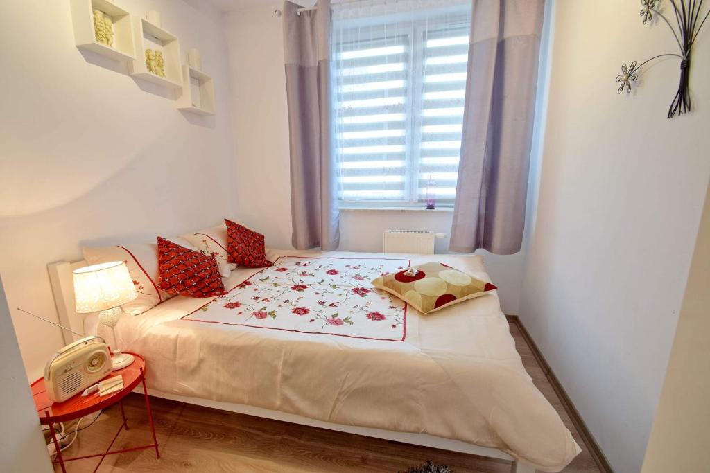Łóżko lub łóżka w pokoju w obiekcie Apartament Kryształowy Amber Sand w Kołobrzegu