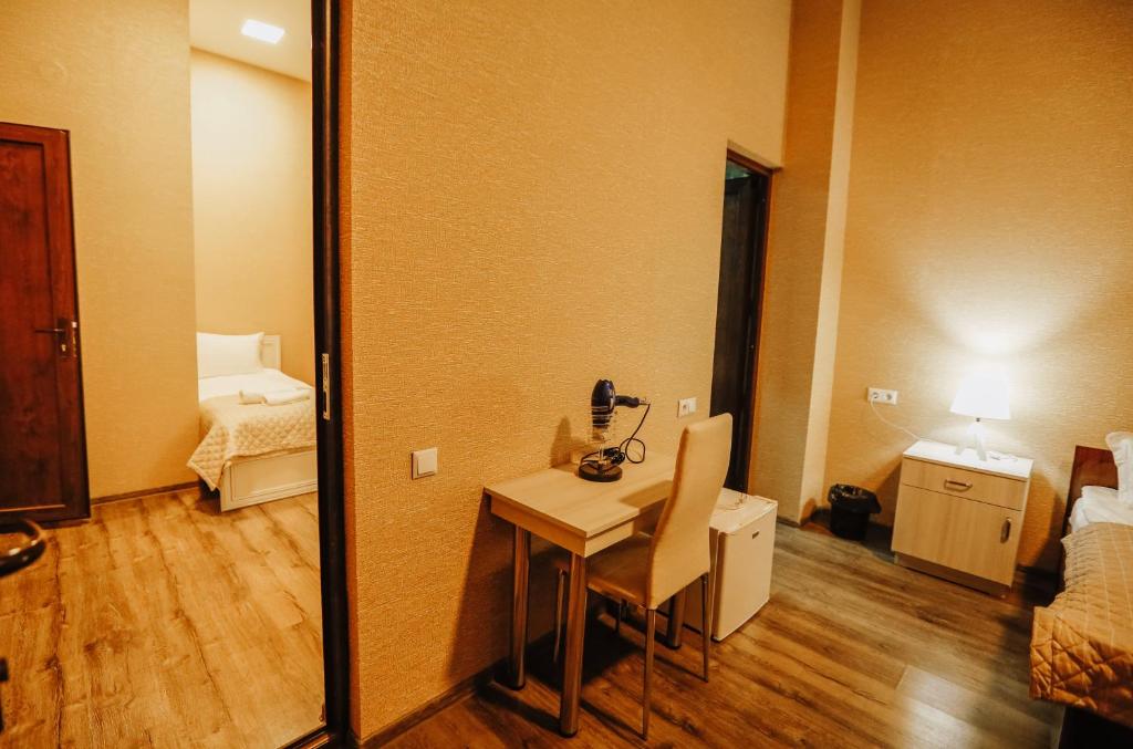 Postel nebo postele na pokoji v ubytování SResidence