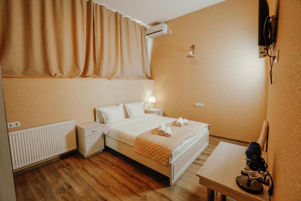 Postel nebo postele na pokoji v ubytování SResidence