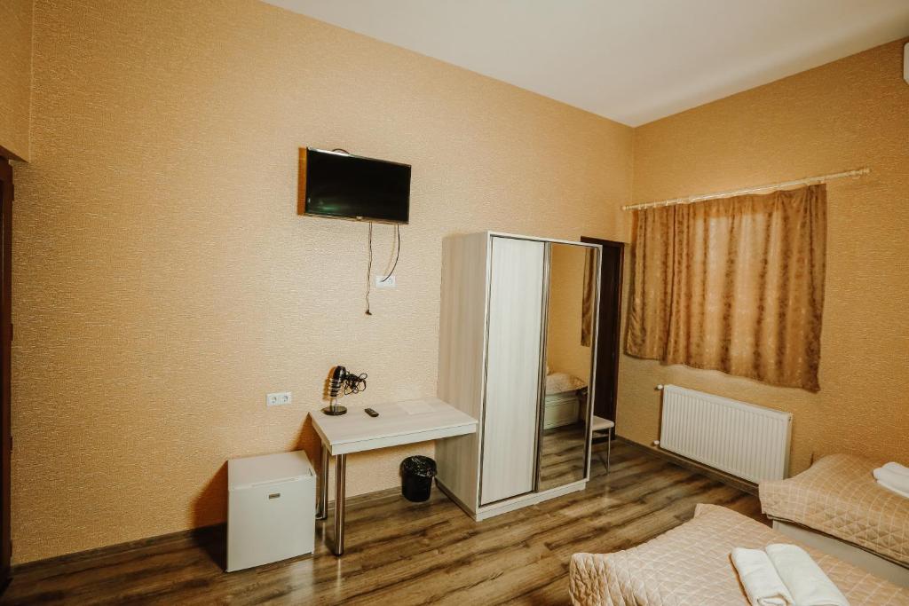 Postel nebo postele na pokoji v ubytování SResidence