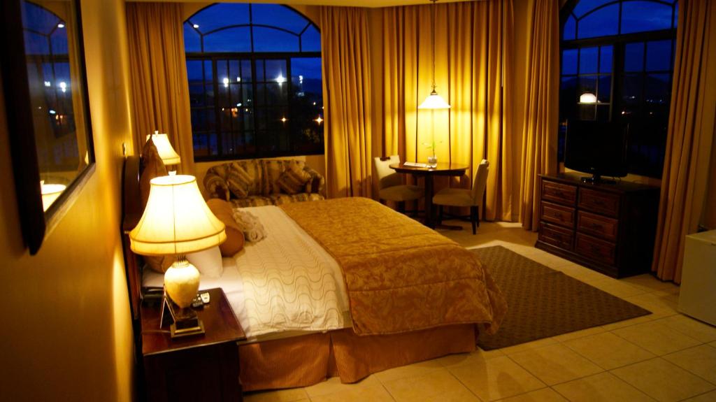 Cama o camas de una habitación en Hotel Monteolivos