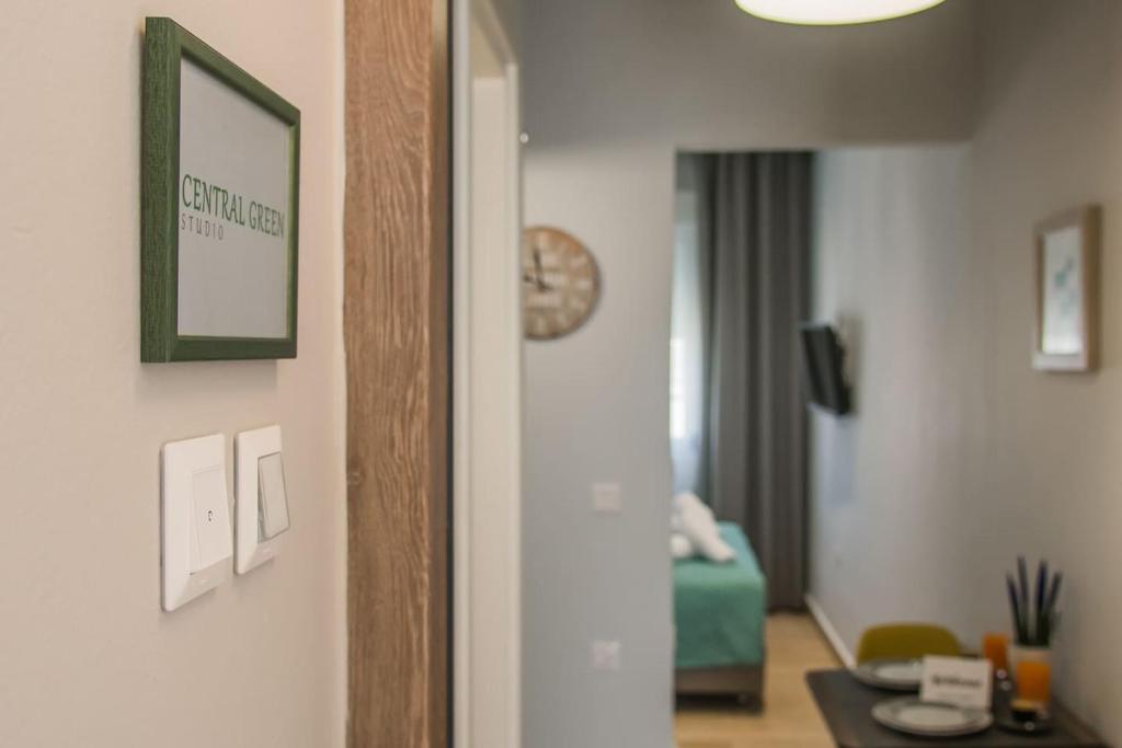 A bed or beds in a room at Central Green Studio