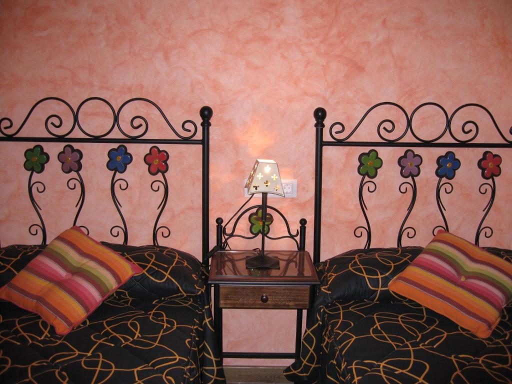 Postel nebo postele na pokoji v ubytování Casa Herrero