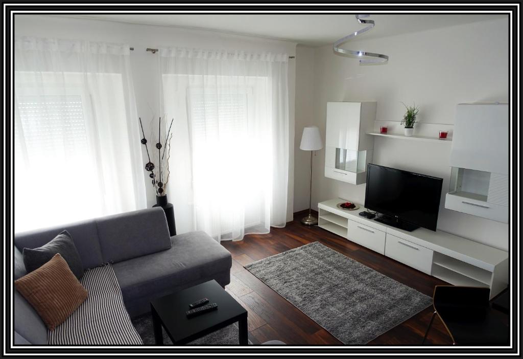TV a/nebo společenská místnost v ubytování Sankt Veit Apartment