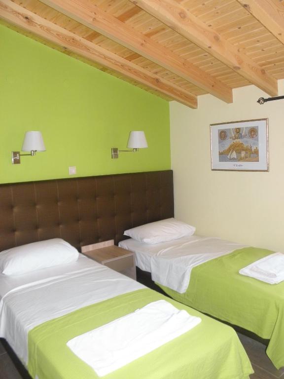 Postel nebo postele na pokoji v ubytování Makedonia Hotel