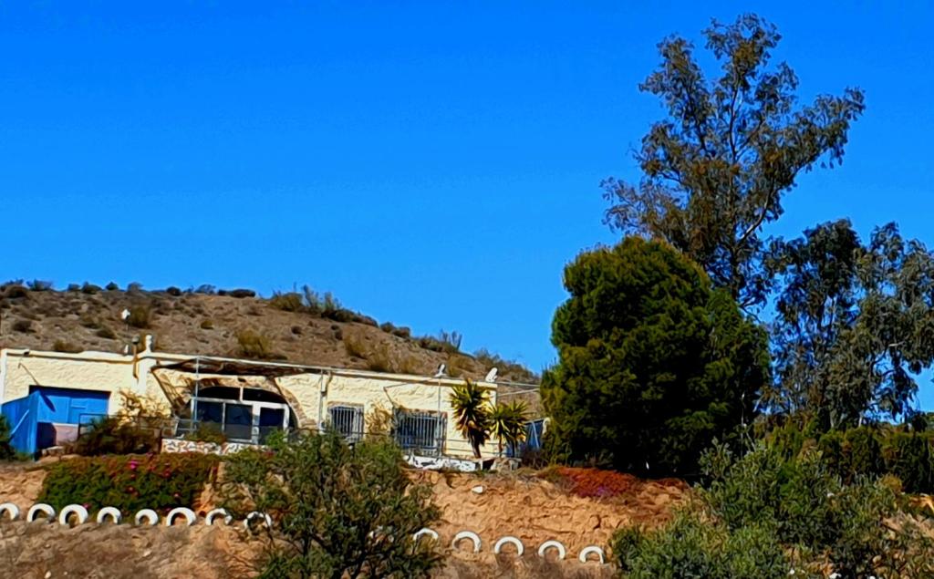 a house sitting on top of a hill at Casa de desierto in Tabernas