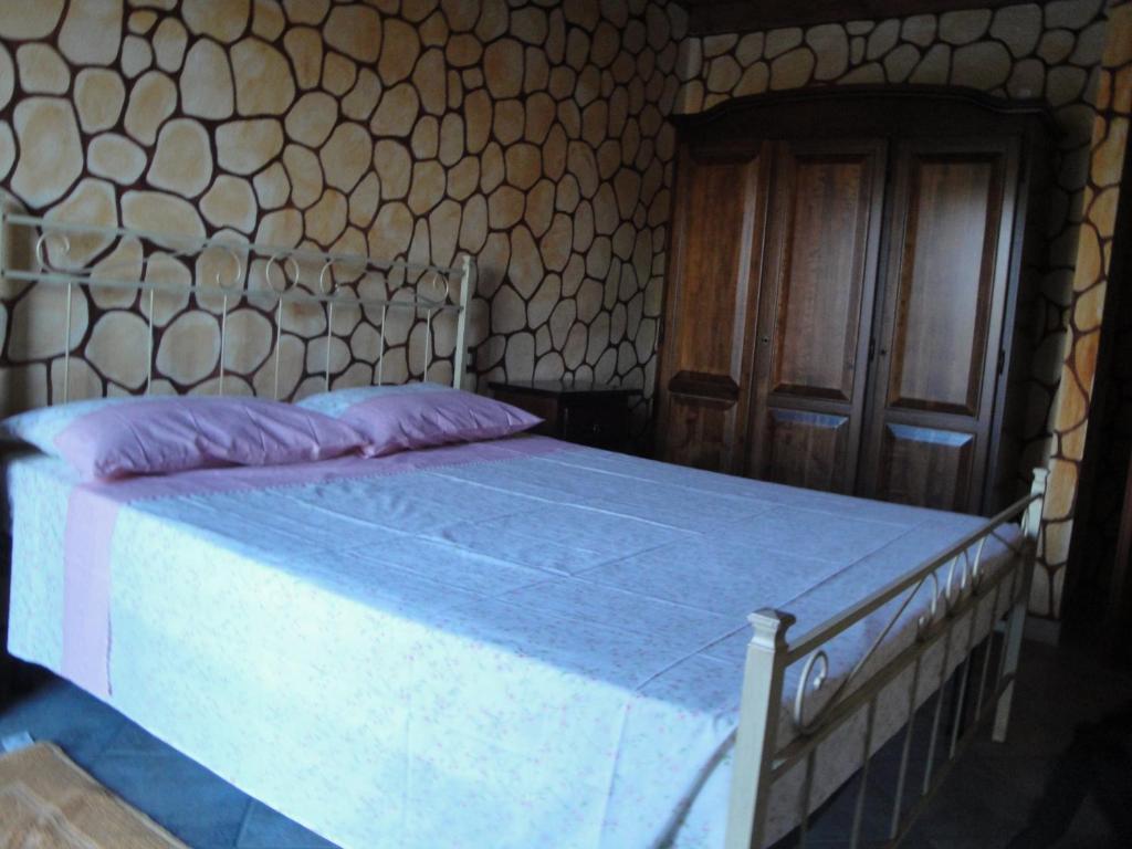 Postel nebo postele na pokoji v ubytování La Jatta