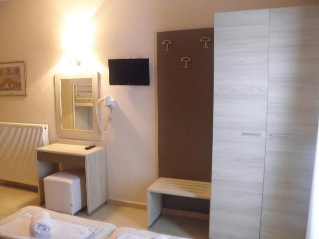 TV a/nebo společenská místnost v ubytování Makedonia Hotel