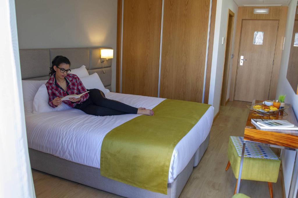 Postel nebo postele na pokoji v ubytování Hotel Fafense