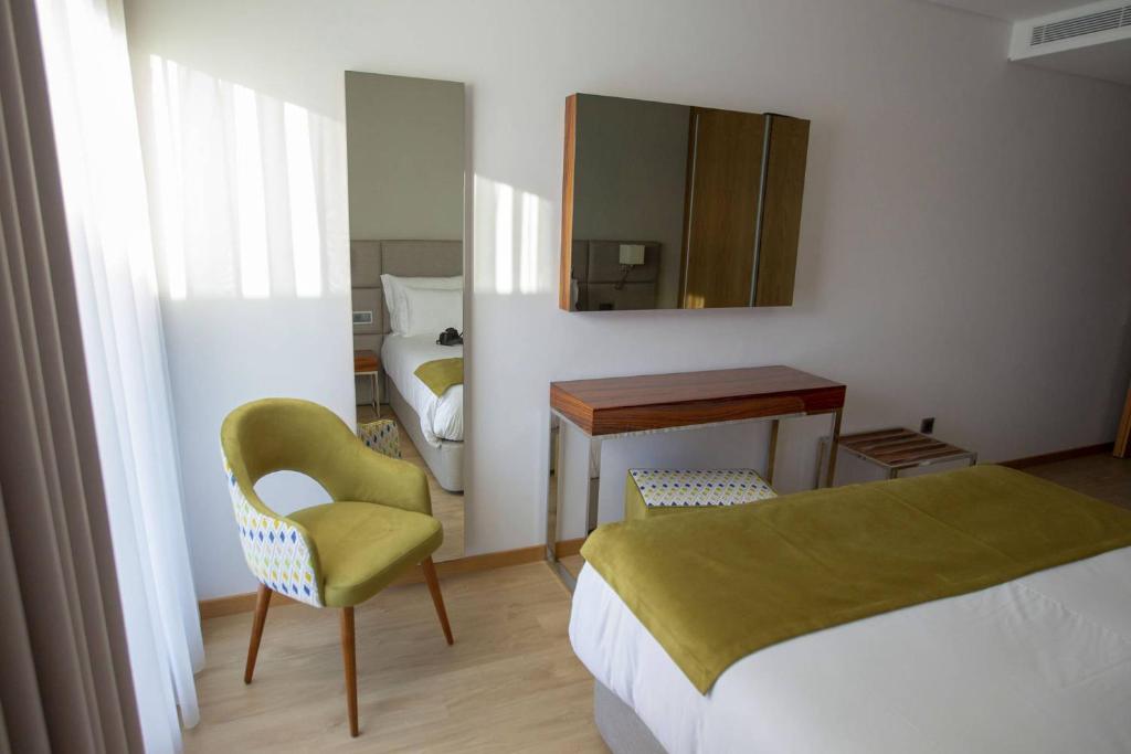 Postel nebo postele na pokoji v ubytování Hotel Fafense