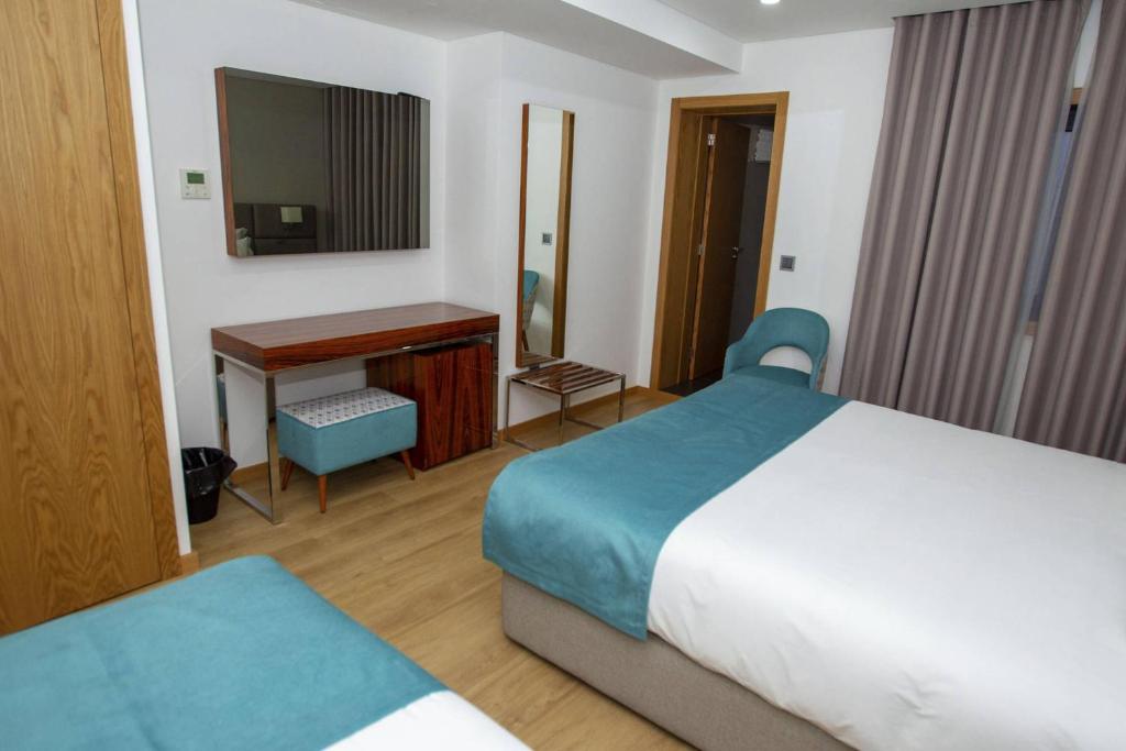 Postel nebo postele na pokoji v ubytování Hotel Fafense