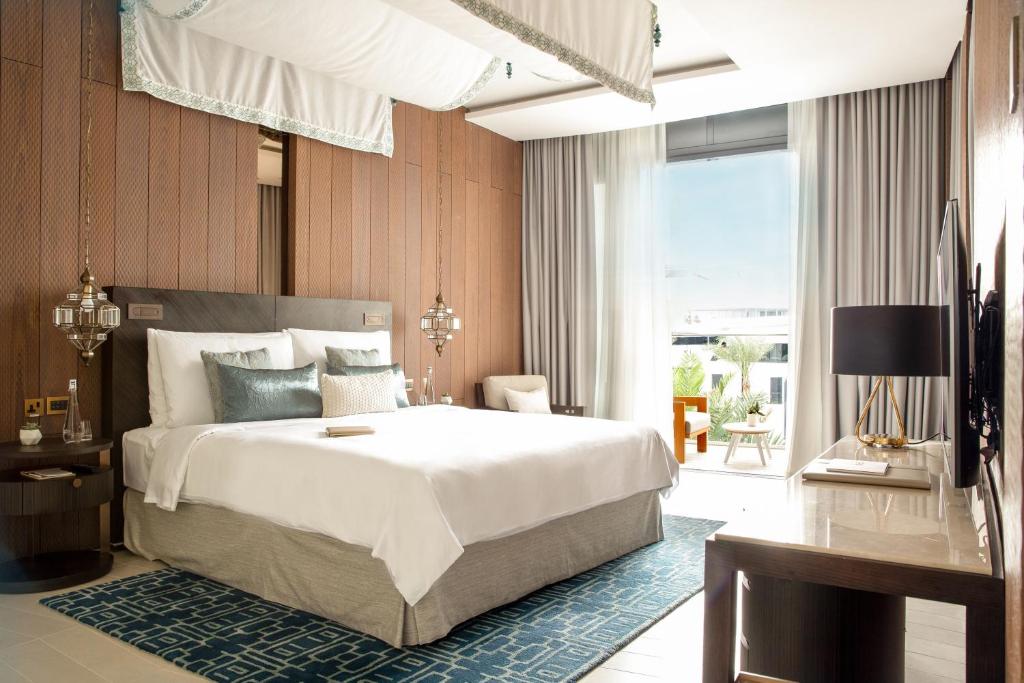 Voodi või voodid majutusasutuse Jumeirah Saadiyat Island Abu Dhabi toas