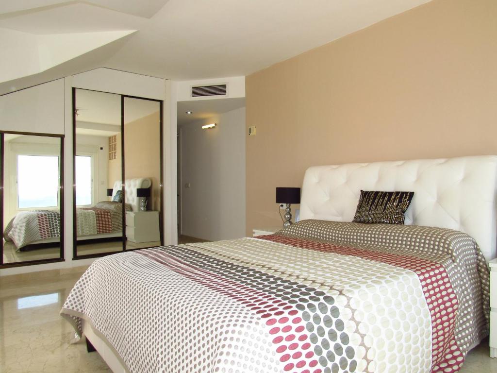 Postel nebo postele na pokoji v ubytování Torreon del Mar Penthouse Deluxe