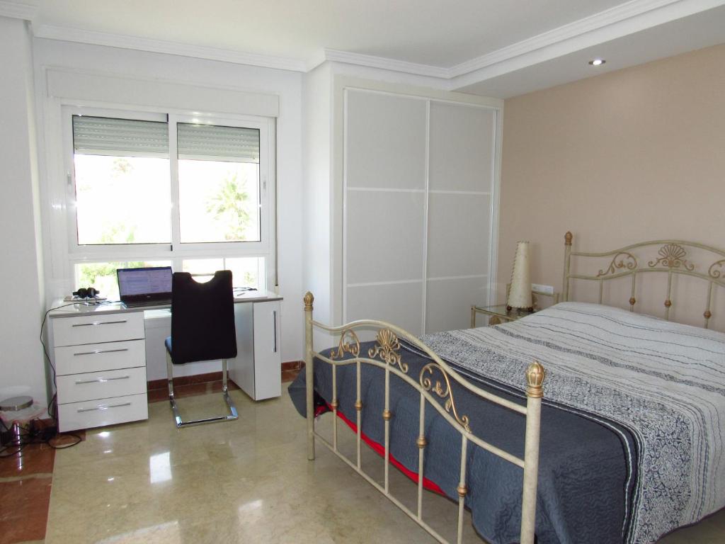 Postel nebo postele na pokoji v ubytování Torreon del Mar Penthouse Deluxe