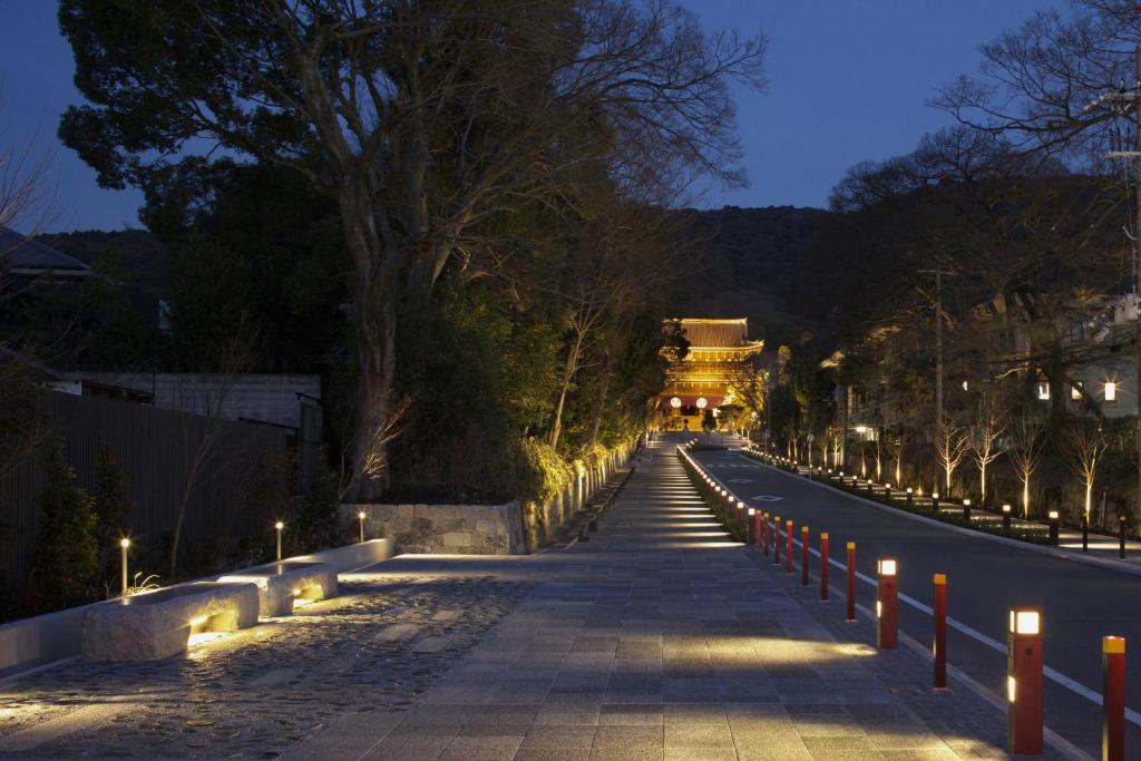 a street with lights on the side of a road at Chion-in Wajun Kaikan in Kyoto