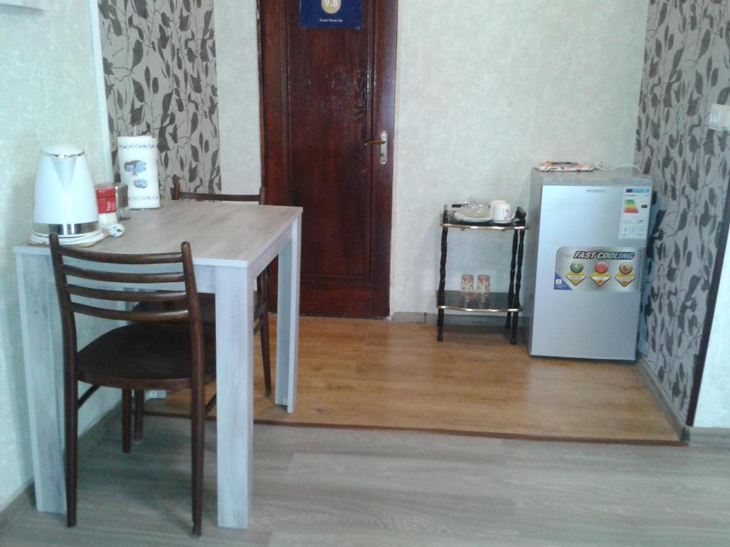 Kuchyň nebo kuchyňský kout v ubytování Guest house UTA