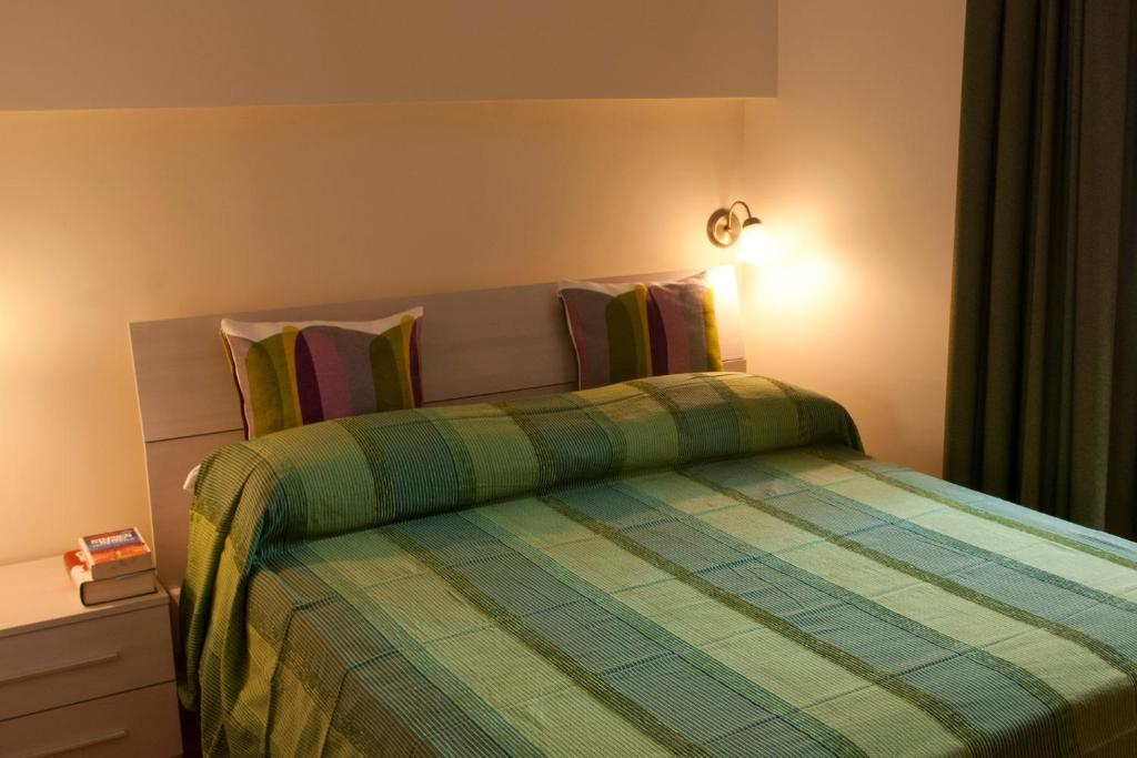 Cama o camas de una habitación en Le Cupoline