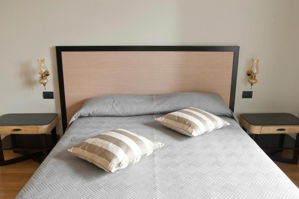 Cama o camas de una habitación en Le Cupoline