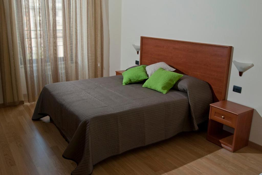 Cama o camas de una habitación en Le Cupoline