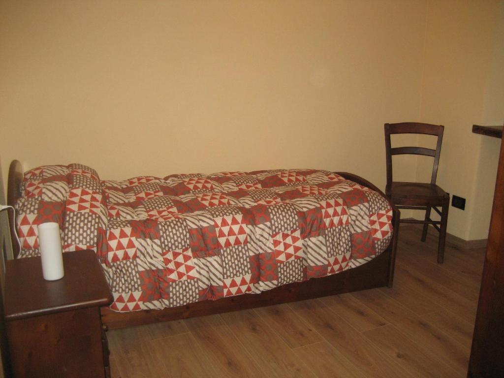 Postel nebo postele na pokoji v ubytování Deliziosa casetta