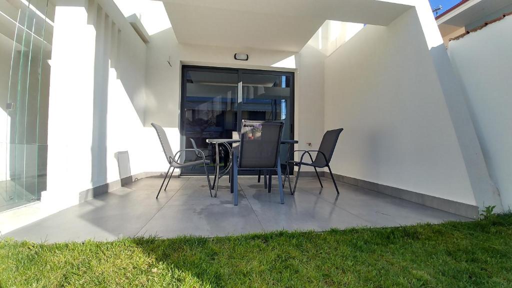 Patio alebo iná vonkajšia časť ubytovania OpenSky Pool