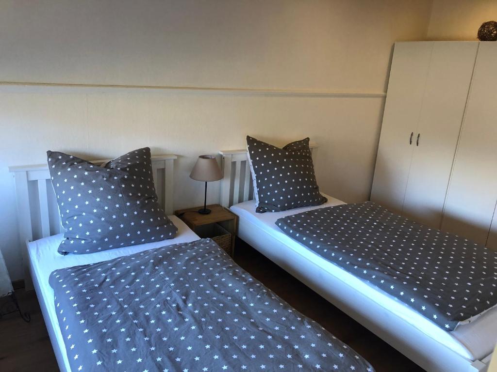 Postel nebo postele na pokoji v ubytování Ferienwohnung Basthorst