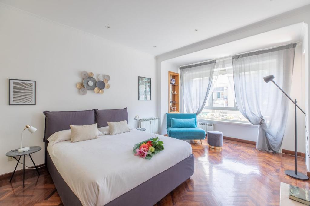 Postel nebo postele na pokoji v ubytování Vatican Cozy Apartment with Terrace
