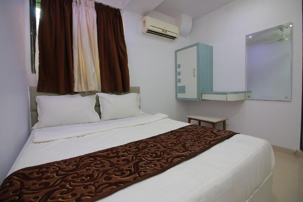 Postel nebo postele na pokoji v ubytování Hotel Apex