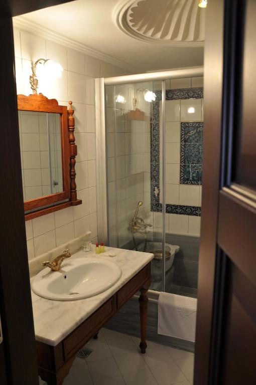 Koupelna v ubytování Aruna Boutique Hotel