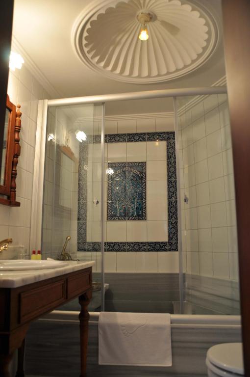 Koupelna v ubytování Aruna Boutique Hotel