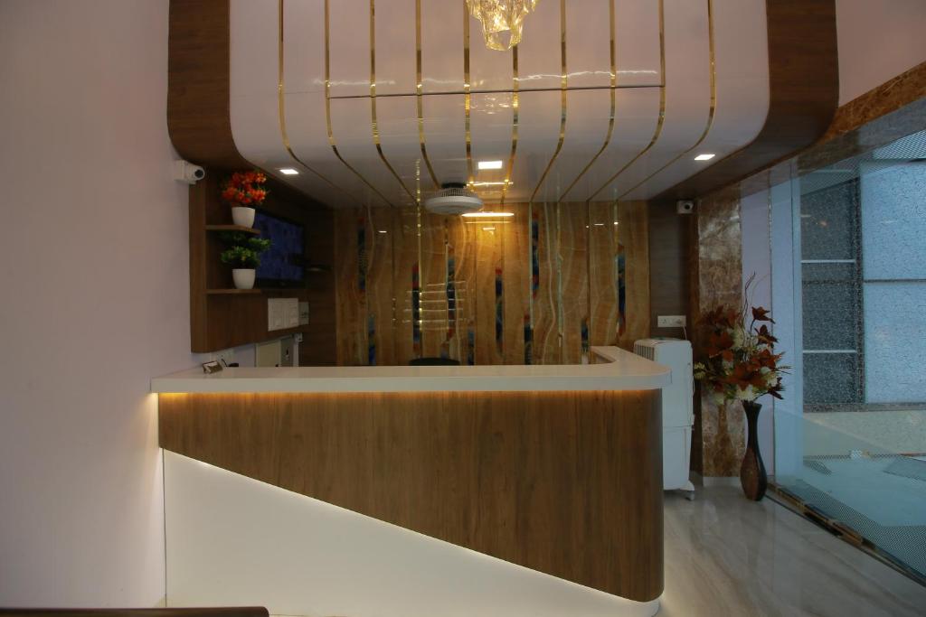 Postel nebo postele na pokoji v ubytování Hotel Apex
