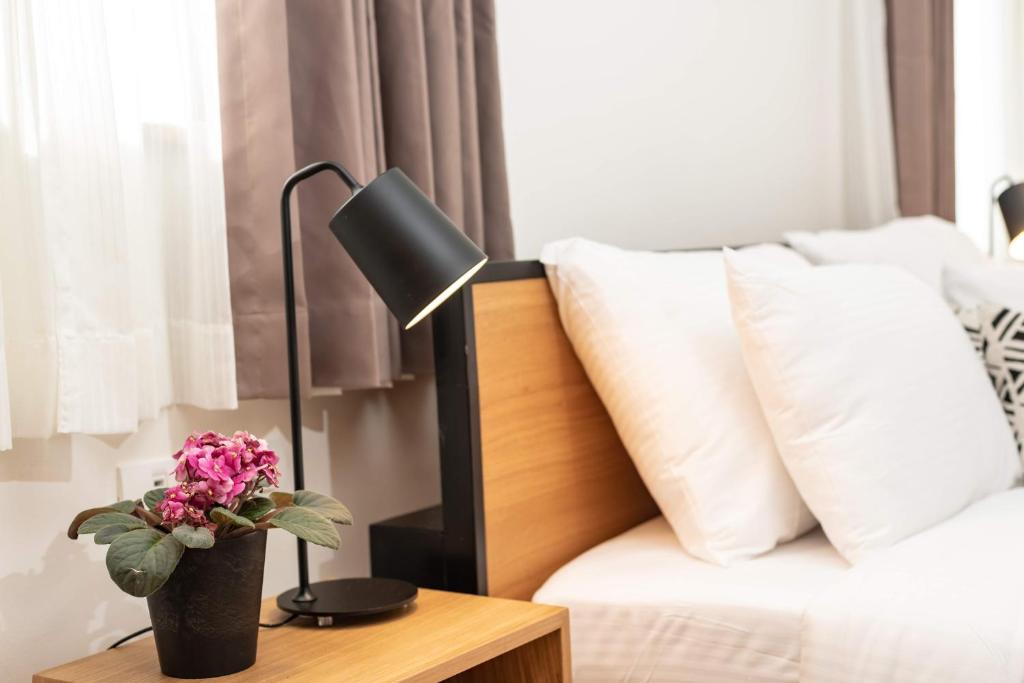 Postel nebo postele na pokoji v ubytování Biazi Hotel