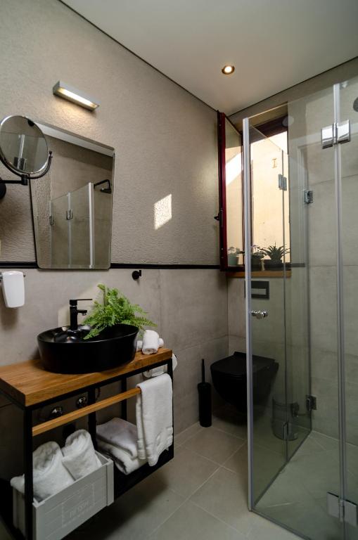 Koupelna v ubytování Biazi Hotel
