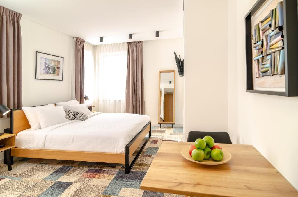 Postel nebo postele na pokoji v ubytování Biazi Hotel
