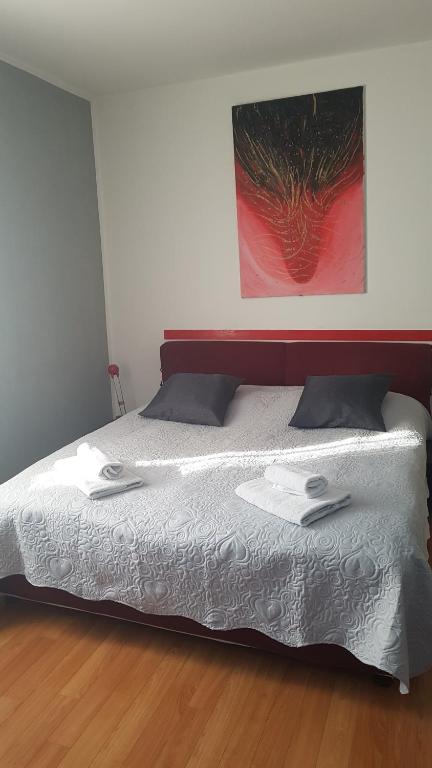 Postel nebo postele na pokoji v ubytování Homestay Dodo