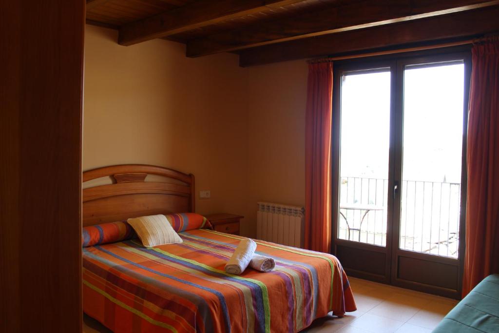 Posteľ alebo postele v izbe v ubytovaní Allotjament Rural Casa Bernat