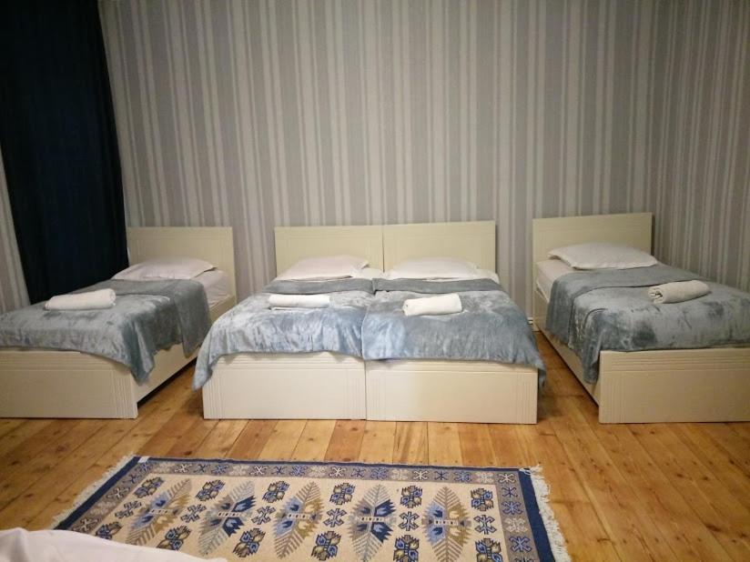 Postel nebo postele na pokoji v ubytování Abramichi Guest House